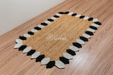 Angled view of natural jute runner rug in a hallway