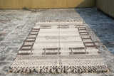Farmhouse rug edge and fringe close-up detail