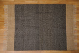 Full view of chunky loop rug on floor