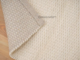 Ivory chunky loop wool rug flat lay