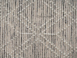 Beige wool rug styled in a living room