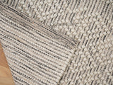 Chunky wool rug styled in a living room