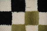 Close-up of checkered wool loop texture
