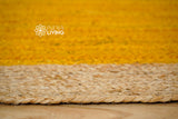 Yellow jute rug styled in a living room setting