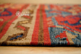 Red Afghan style kilim rug texture close-up