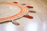 Orange jute mat tassel detail