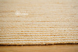 White jute rug texture close-up