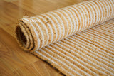 White jute rug styled in a living room