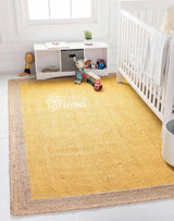 Natural yellow jute bordered area rug, flat lay view