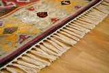 Kilim rug styled in bedroom