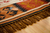 Beige southwestern kilim rug corner detail