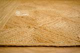 Close-up of braided jute rug texture