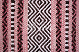 Pink kilim rug shown at an alternate angle