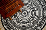 Round mandala mat styled in a living room