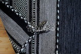 Grey kilim rug in bedroom setting