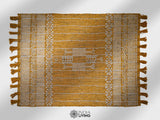 Handwoven yellow tribal petyarn rug, flat lay view