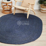 Oval rug corner detail showing braided edge