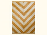White jute braided rug styled in a bright living room