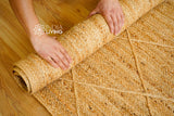 Overhead view of natural diamond jute rug