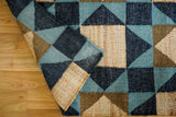 Rug styled with modern minimalist decor accents