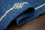 Blue kilim rug fringe and braid detail