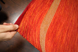 Overhead view of red diamond kilim pattern