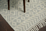 Handwoven diamond loop wool rug texture close-up