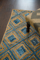 Blue braided jute rug, flat lay view