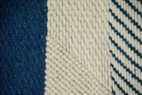 Bohemian blue wool rug styled in living room