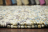 Multi colour wool rug styled with furniture