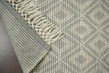 Diamond loop wool rug flat lay showing full pattern