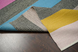 Rainbow kilim rug styled in modern living room