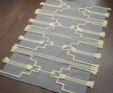 Gray wool area rug styled in a living room