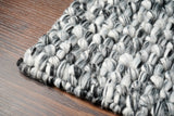 Grey mixture loop chunky wool rug corner detail