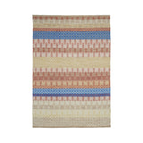 Beige striped rug styled in Scandinavian living room
