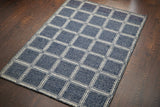 Overhead view of blue geometric wool rug