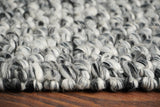 Grey mixture loop chunky wool rug pile detail