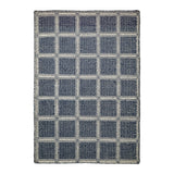 Blue geometric wool rug, full flat view