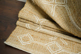 Jute rug corner detail showing latticework pattern