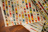 Corner detail of striped chunky rug