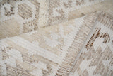 White rug corner detail with fringe edge