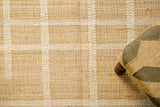 Close-up of jute rug weave and white stripe detail