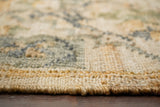 Sage green jute rug styled in living room