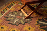 Southwestern kilim rug styled in a living room