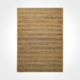 Black jute rug in entryway setting