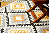 Tribal Aztec rug styled in a dining room