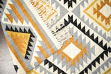 Tribal Aztec rug in a living room setting