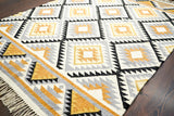 Colourful tribal rug in a bohemian styled room