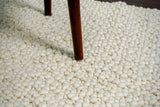 Full view of pebble-texture rug on floor