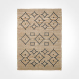 Handwoven natural jute area rug with ivory tribal lattice motif, flat view